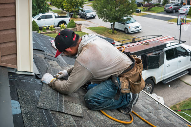 Professional Storm Damage Roof Repair technician working in Heath, TX